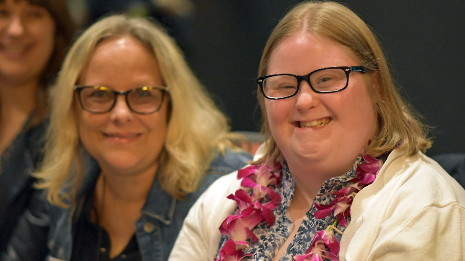 Transition Academy graduate Allison Gollehon (right) is all smiles alongside her teachers at the combined graduation ceremony with Project Search on June 10, 2022.